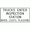 Trucks Enter Inspection Station When Lights Flashing