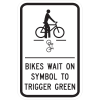 Bikes Wait On Symbol To Trigger Green